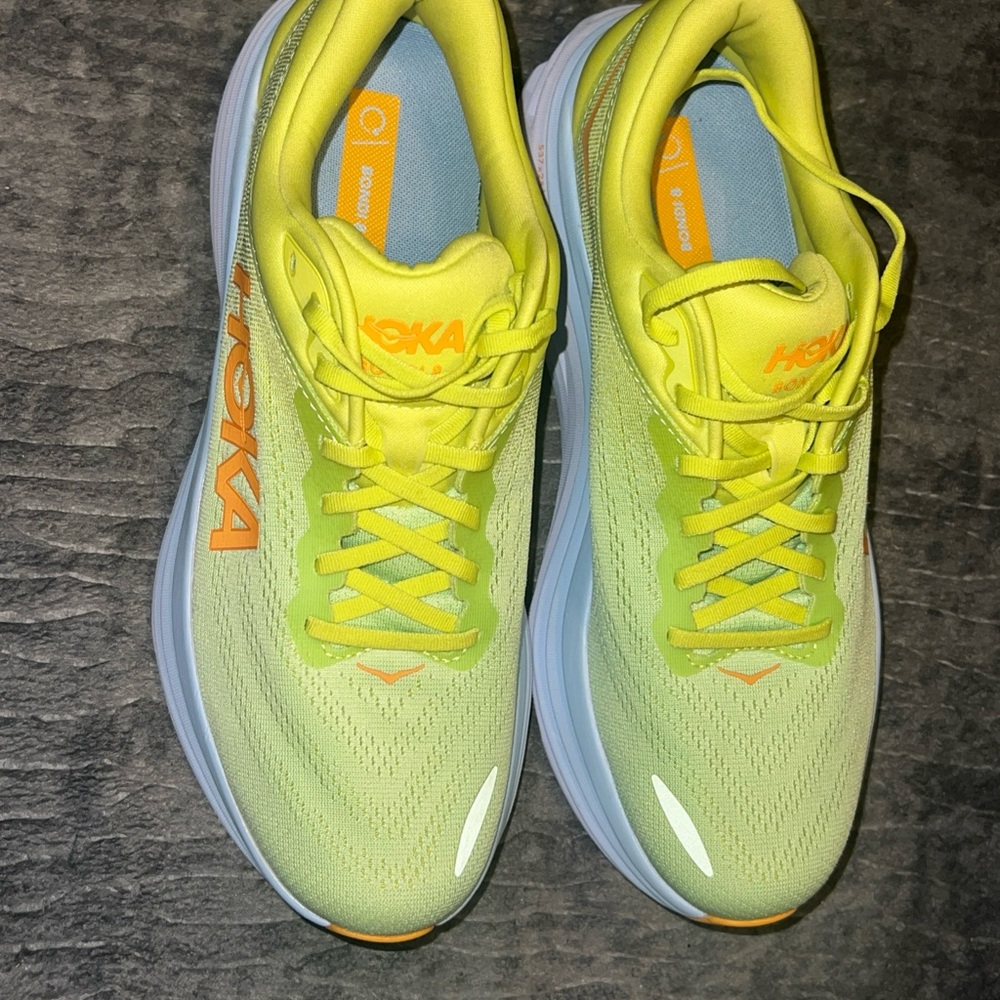 Hoka Neon Yellow and Orange Athletic Shoes